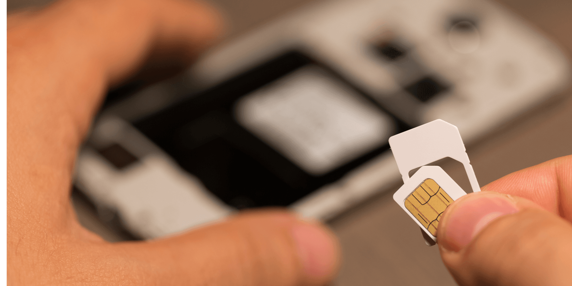 Person using a mobile phone at home