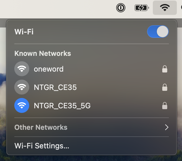 Laptop WiFi menu showing NETGEAR network